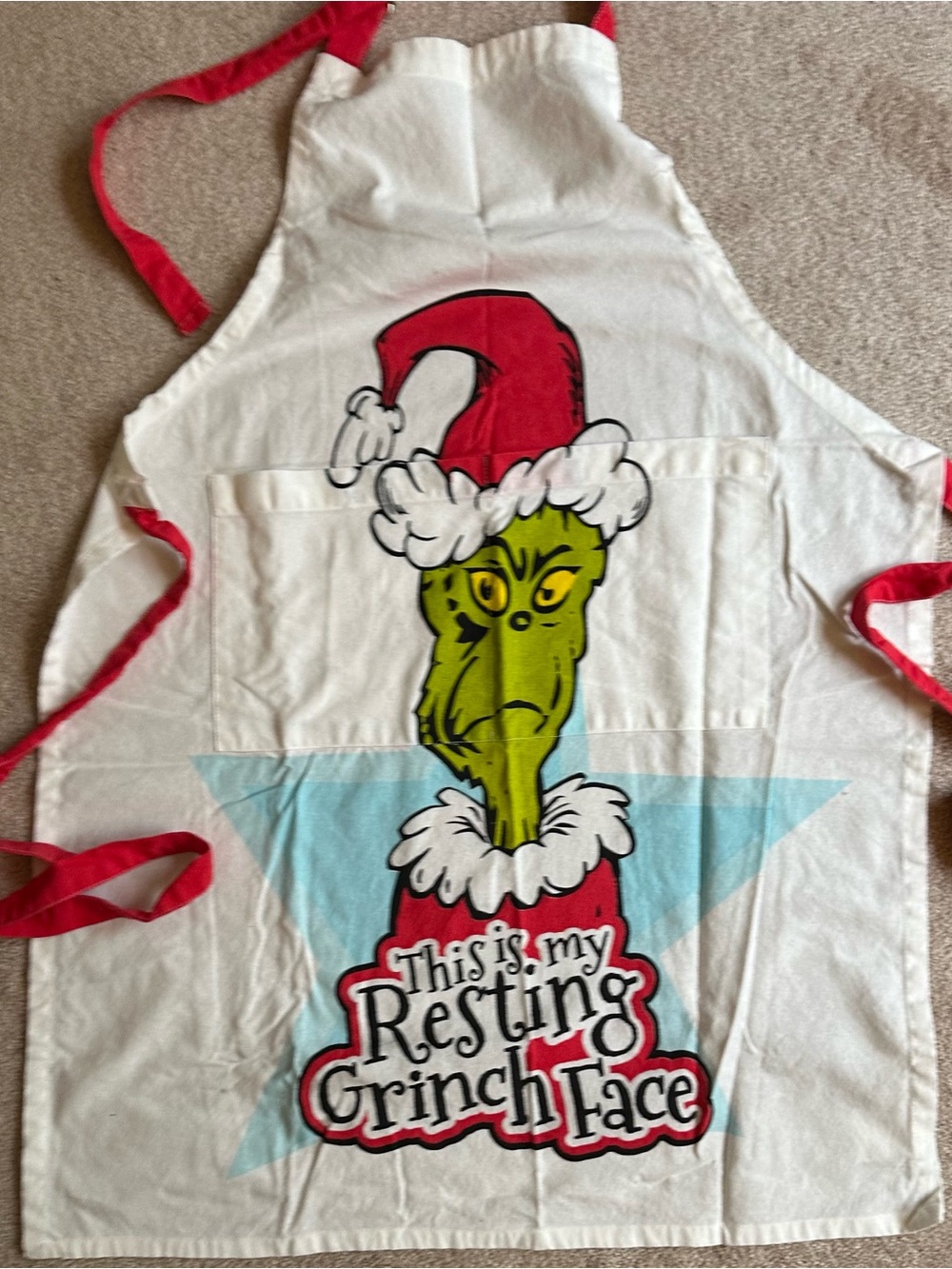 The Grinch Holiday Apron with Red Trim Resting Grinch Face Christmas Apron